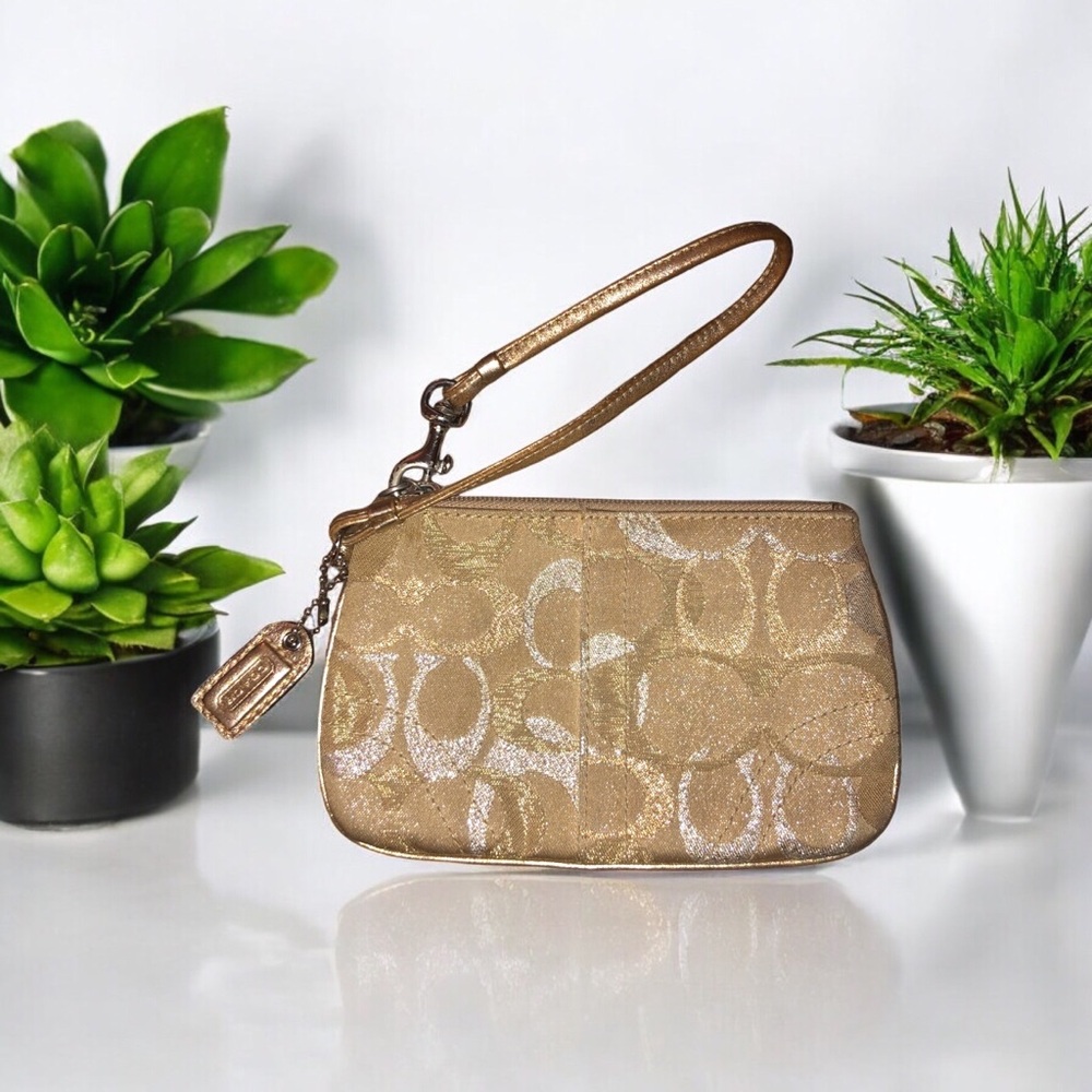 16. COACH Vintage Metallic CC Canvas Wristlet